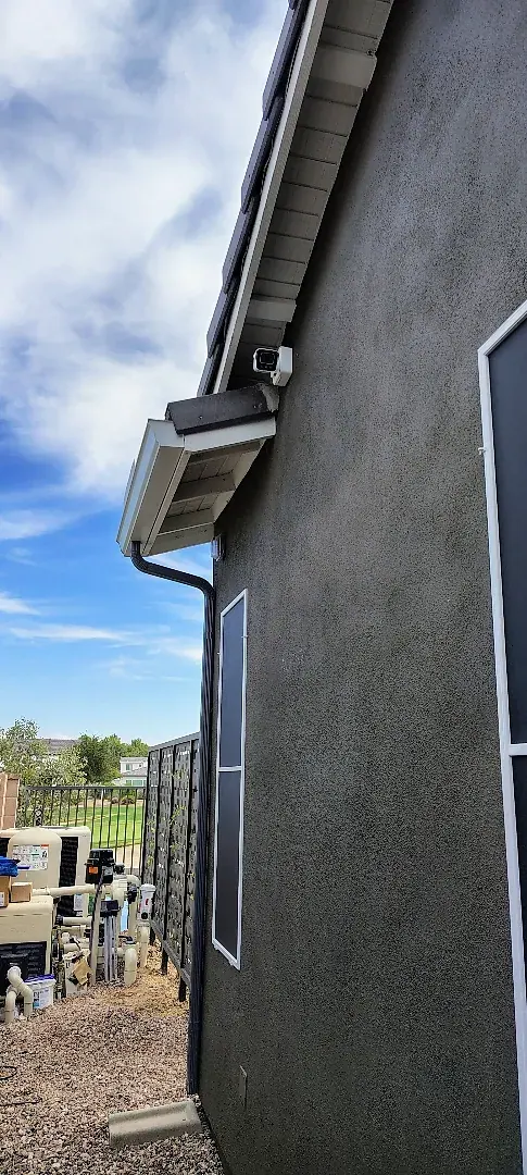 Exterior camera mounted along the side of the Surprise home